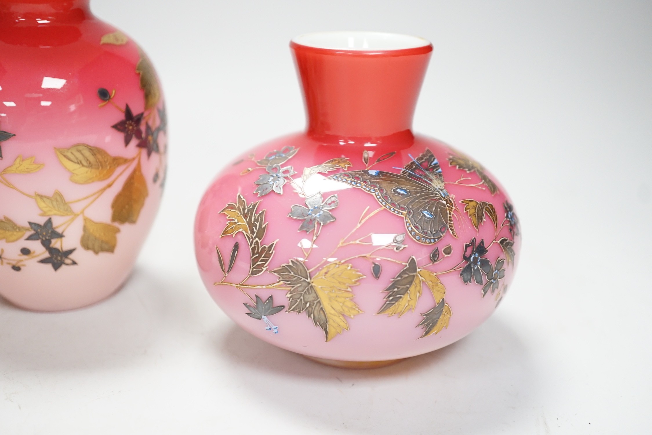 A pair of Stourbridge peach blow vases and another, tallest 13cm